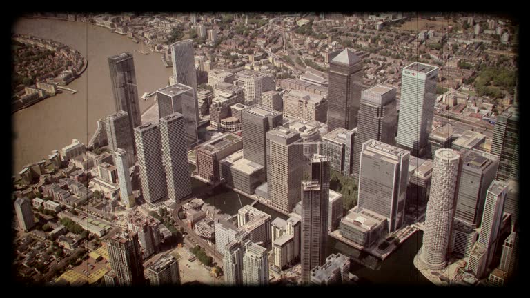 Old Film Aerial View of Canary Wharf in London, UK. 4K