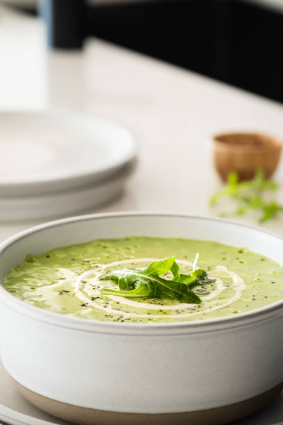 Creamy Vegan Arugula Soup stock photo
