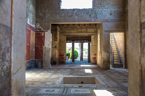 Living room in Pompeii city destroyed in 79BC by the eruption of volcano Vesuvius, Italy in a beautiful summer day