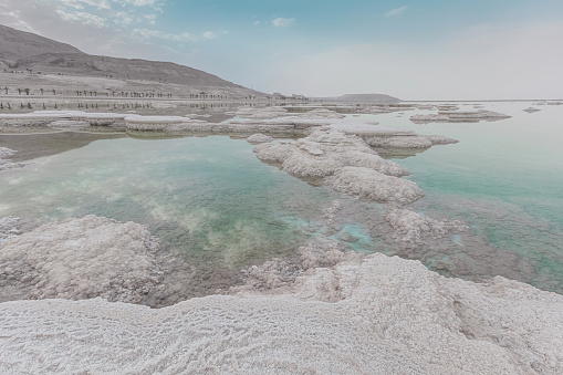 Dead Sea near Ein Bokek and a lot of salt along the coast