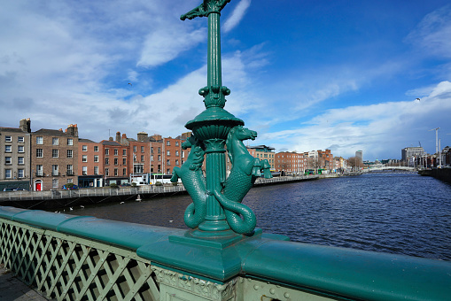 View along the River Liffey in Dublin from the Grattan Bridge, looking east towards the Ha'penny Bridge