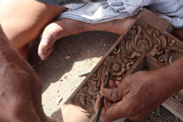 istock wood carving craftsman 1479253052