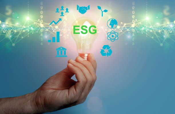 istock Global ESG technology concept. Man's hand presses a holographic button. Environmental, Social, and Corporate Governance idea. 1479255990