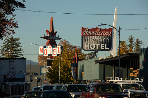 Redding, California, USA - November 22, 2021: Late afternoon sun shines on a historic hotel signage in downtown Redding.