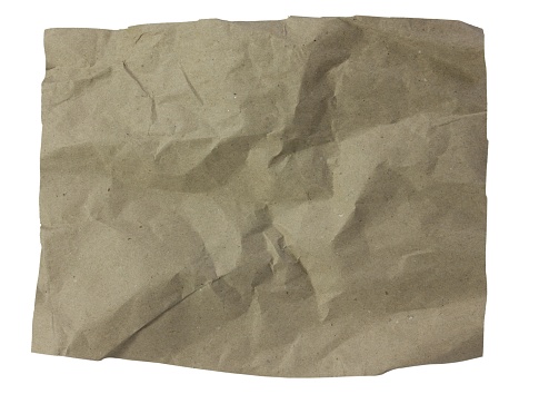 A piece of crumpled kraft paper isolated on a white background.