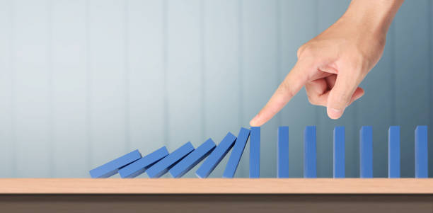 istock The Domino effect stopped by unique 1479267505