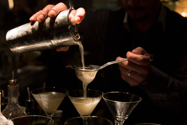 istock Bartender preparing cocktails in a martini glass. 1479272273