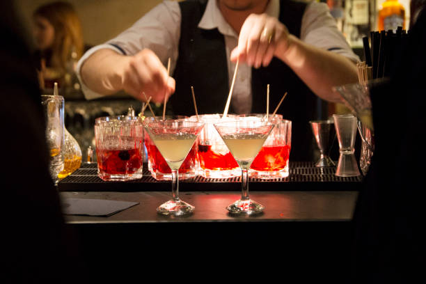 istock Bartender preparing cocktails in a martini glass. 1479272280