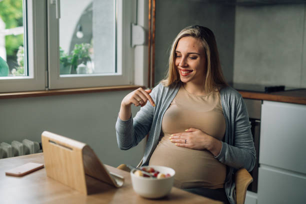 istock pregnant woman at home 1479275968