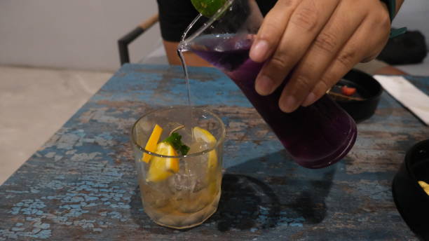 istock Lemon cocktail poured into glass 1479282761