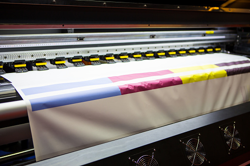 Large format sublimation printer for textiles. Printing industry.
