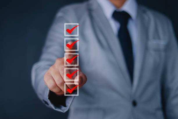 istock Businessman checks the checkmark on the checklist. 1479288899