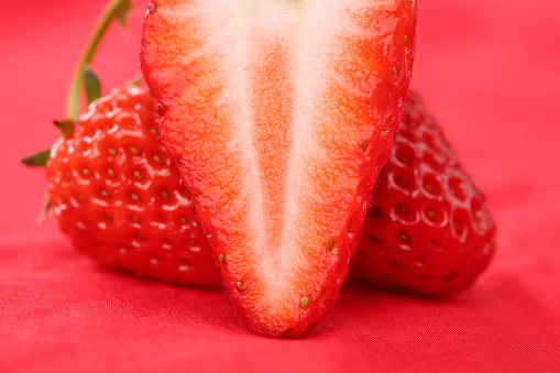 Strawberry on red background