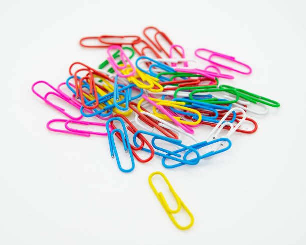 istock Paper colored clips isolated on white background 1479294552