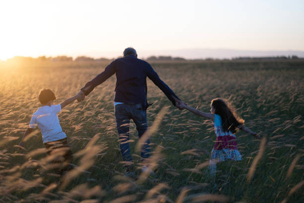 istock Happy father and children 1479297234