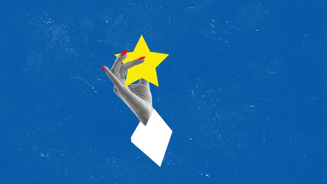 Stop motion, animation. Female hand holding big yellow star over blue background. Good luck symbol
