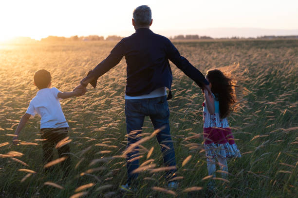istock Happy father and children 1479297891