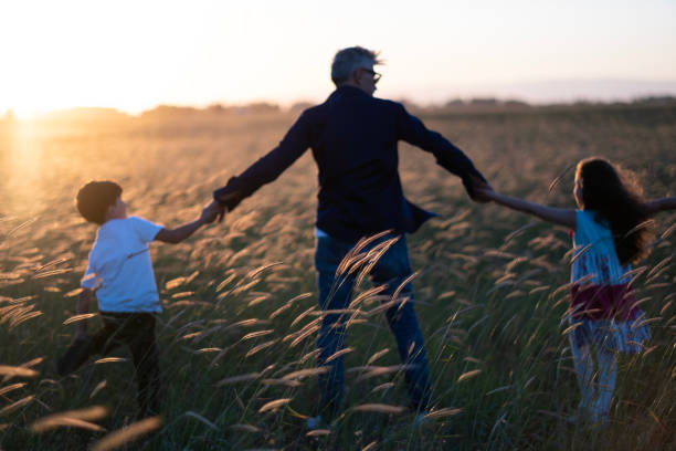 istock Happy father and children 1479297965