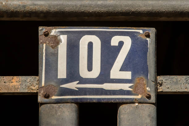 istock Weathered enameled plate number 102 1479300946