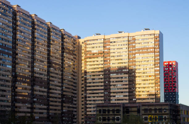 istock multi-storey buildings against a bright blue sky and a space for copy 1479302396