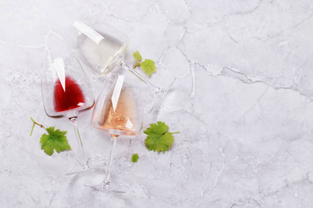 istock White, rose and red wine glasses 1479303324