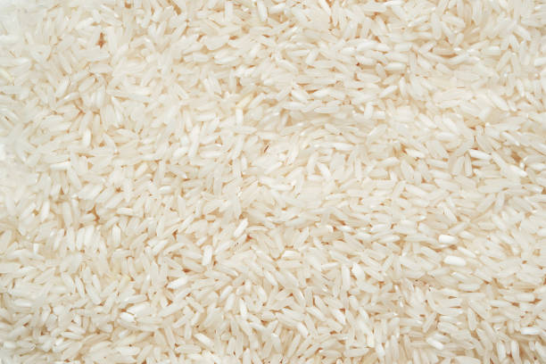 istock Polished long-grain rice, texture in close-up. 1479304577