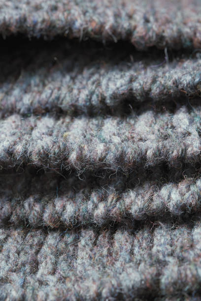 istock Dark gray zigzag knitted fabric. Knitted texture. 1479304627