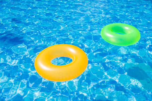 istock Colorful Inflatable Swimming Ring floating in the pool 1479307268