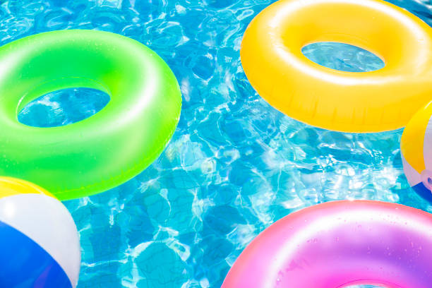 istock Colorful Inflatable Swimming Ring floating in the pool 1479307376