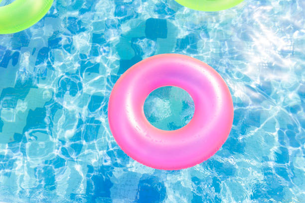 istock Colorful Inflatable Swimming Ring floating in the pool 1479307412
