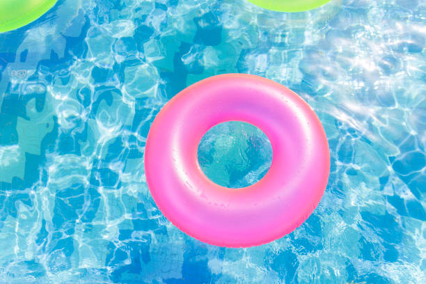 istock Colorful Inflatable Swimming Ring floating in the pool 1479307571