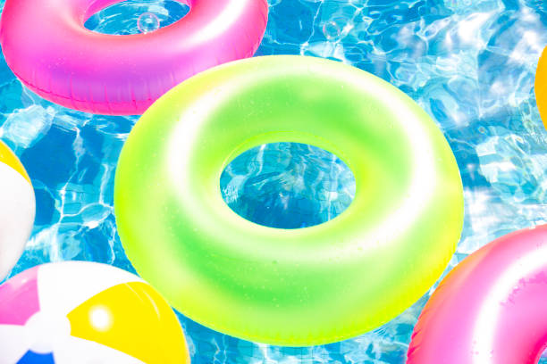 istock Colorful Inflatable Swimming Ring floating in the pool 1479307597