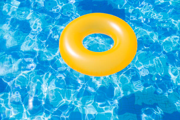 istock Colorful Inflatable Swimming Ring floating in the pool 1479307642