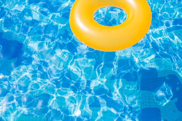 istock Colorful Inflatable Swimming Ring floating in the pool 1479307768