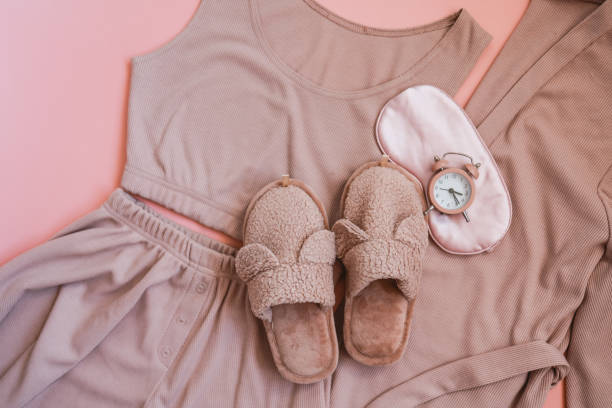 istock Flat lay composition with house slippers, sleeping mask and pajamas on light background 1479307986