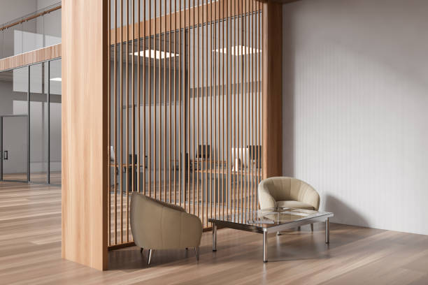 istock Light office interior with relaxing corner with armchairs and coffee table 1479308965
