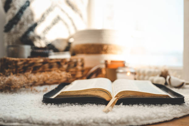 Light falls on an open bible, christian concept.