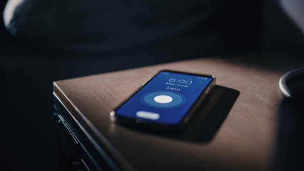 Smartphone Alarm Clock App Rings for Wake up, Screen Shows