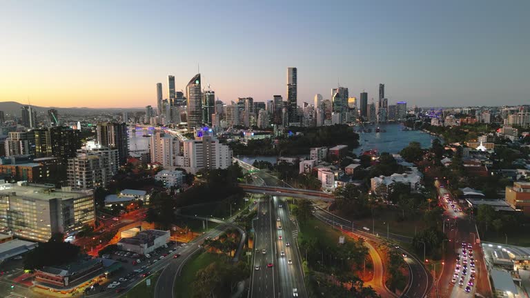 4K Aerial view Real time Footage of Above Captain Cook Bridge, Pacific and riverside Expressway heading to the Brisbane City at rush hour