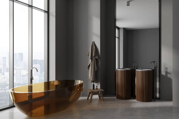 istock Panoramic gray bathroom with transparent tub 1479314361