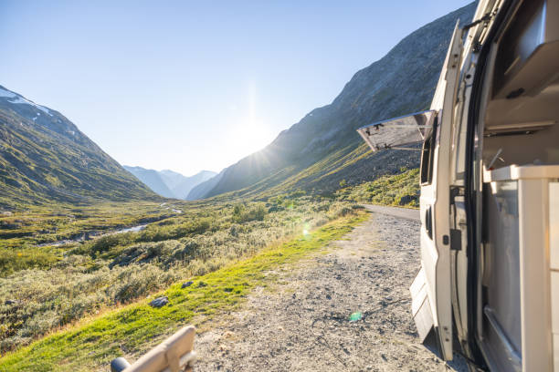 istock Van parked on a mountain pass at sunset, mountain view 1479316947