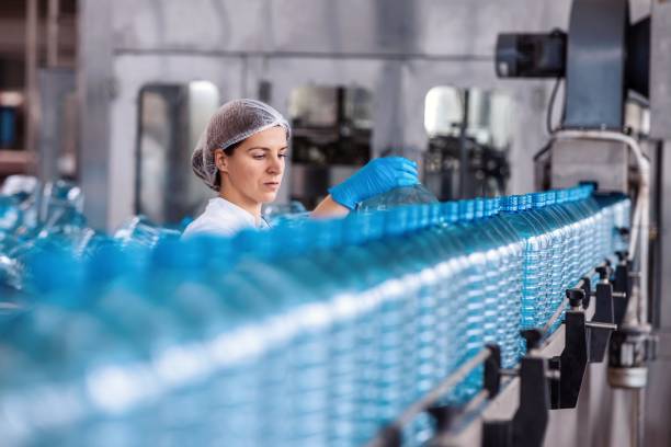 istock Female engineer working on maintenance in bottling plant 1479319603