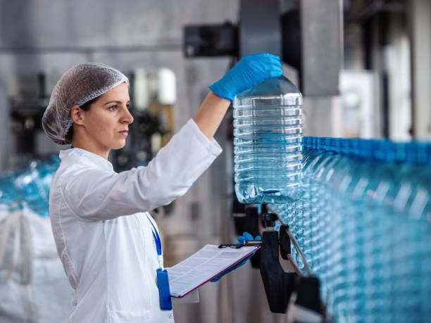istock Female engineer working on maintenance in bottling plant 1479320257