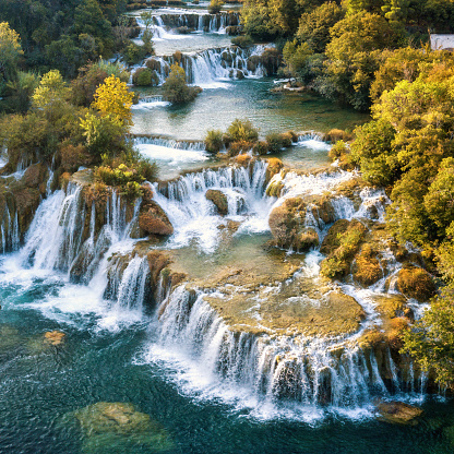 Amazing aerial view of the beautiful waterfall cascade, famous Skradinski buk, one of the most beautiful waterfalls in Europe and the biggest in Croatia, nature landscape, outdoor travel background