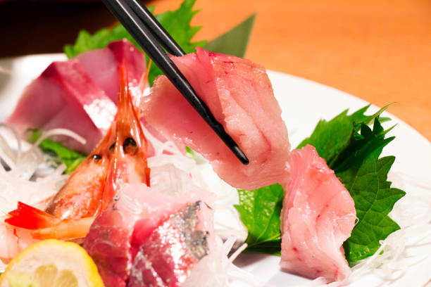 istock fresh fish platter sashimi on a plate, close up, select focus 1479326541