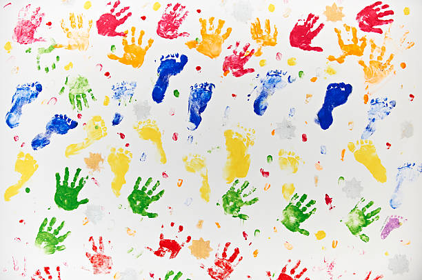 istock Colourful Design Made From Child's Hand And Foot Prints 147932908
