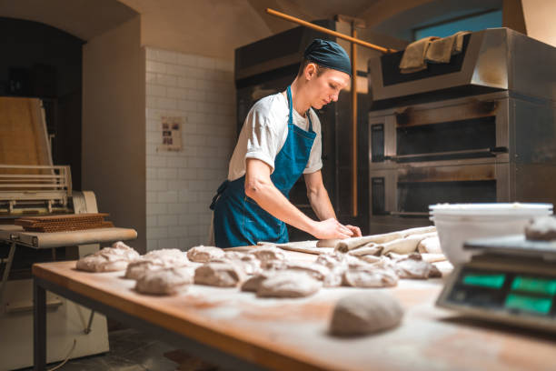Caucasian Baker Working In An Artisan Bakery