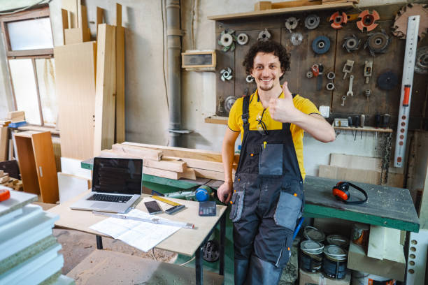 istock Portrait of a smiling carpenter in the workshop 1479332563