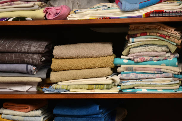 istock Shelves in the closet with clothes. 1479332717