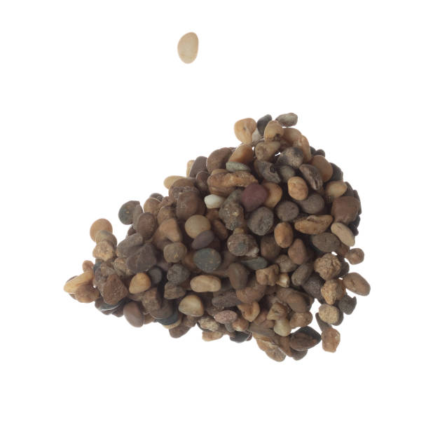 istock Fish Tank decorative Rock stone gravel fly explosion fall, brown stone rock explode abstract cloud fly, splash in air for ground floor. White background isolated high speed shutter freeze shot 1479333900